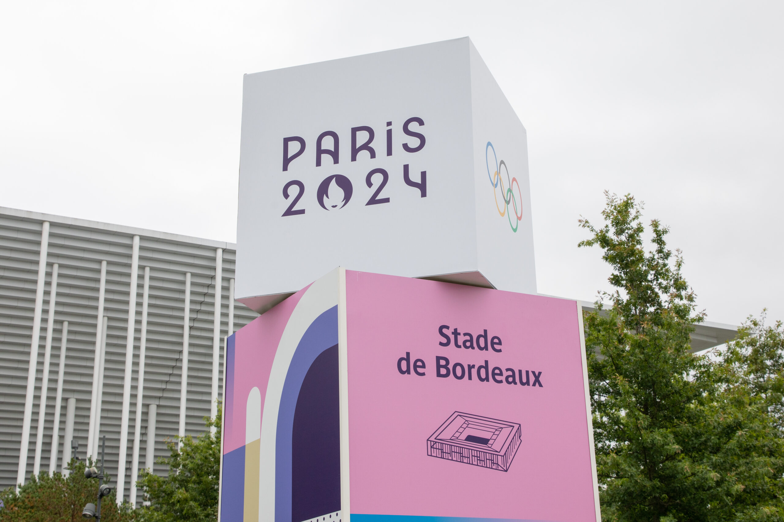 new emblem Paris 2024 Summer Olympic and Paralympic Games with logo sign and text symbol on stade de bordeaux city